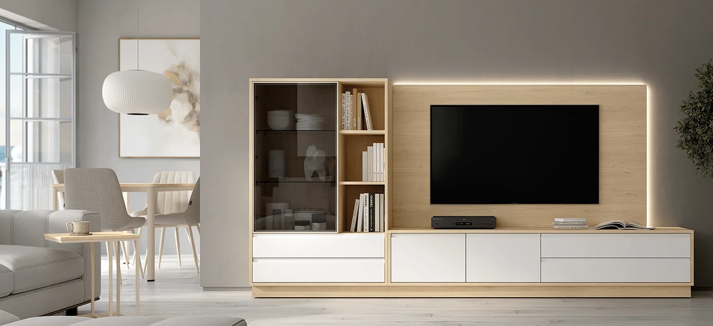 Estantería modular oscura junto a un mueble de televisión