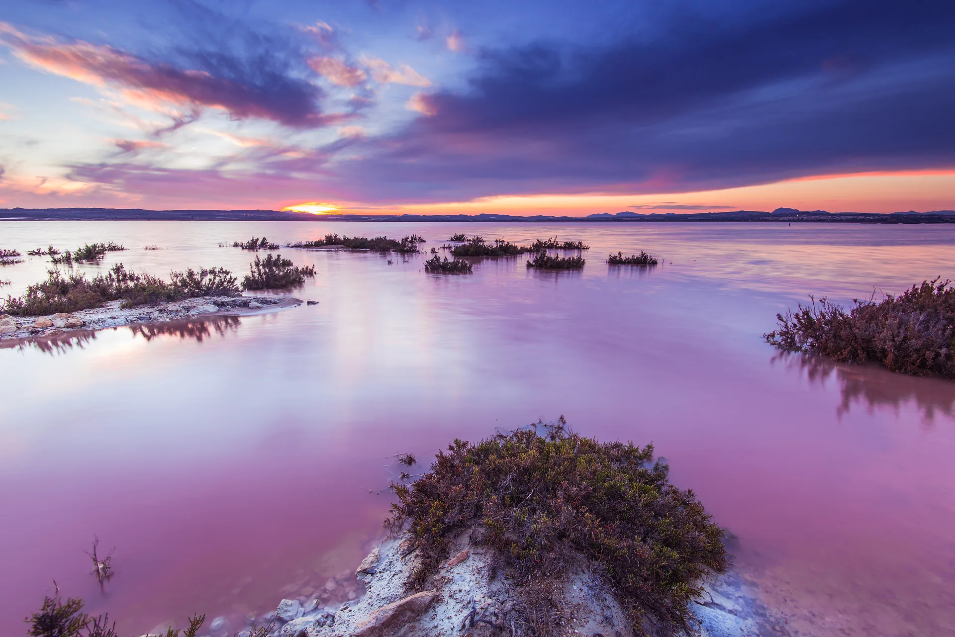 Torrevieja salt lagoon with pink and purple tones at sunset